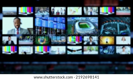 Master control room of TV station concept. Blurred image for background. Royalty-Free Stock Photo #2192698141