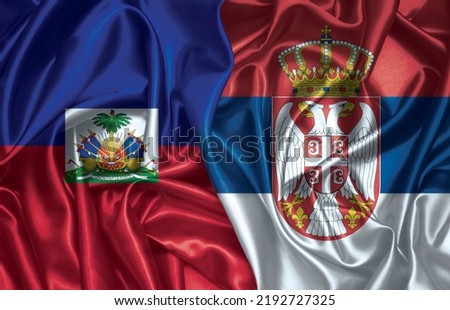 Haiti and Serbia two folded silk flags together