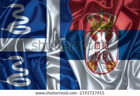 Martinique and Serbia two folded silk flags together