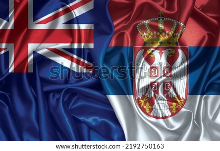 New Zealand and Serbia two folded silk flags together.