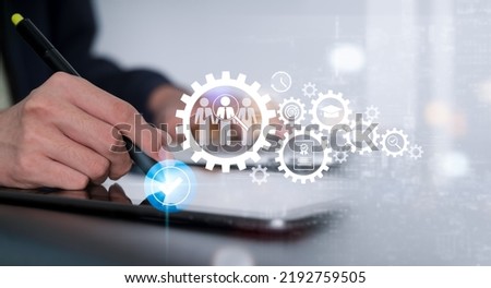 The procedure of job searching, headhunting, and recruitment. There are icons for abilities, education, qualification, interview, and application within the gears. Hiring and human resource automation Royalty-Free Stock Photo #2192759505