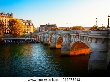 Pont Neuf at sunny fall sunset, Paris, France Royalty-Free Stock Photo #2192759631