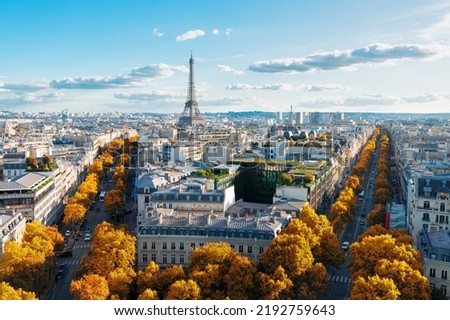 panoramic view of famous Eiffel Tower landmark and Paris boulevard streets at fall, Paris France