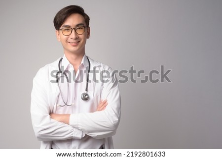 Portrait of male confident doctor over white background studio, healthcare and Medical technology concept. Royalty-Free Stock Photo #2192801633