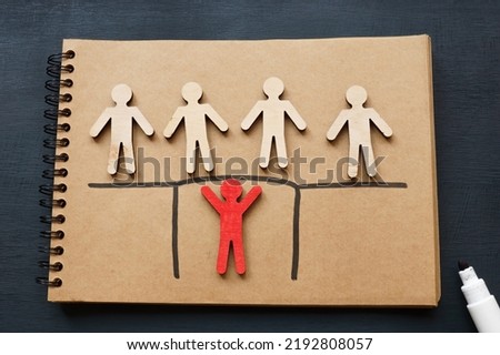 Servant leadership concept. Figures and one holds the bridge. Royalty-Free Stock Photo #2192808057