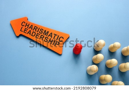 Arrow with words Charismatic leadership and figurines. Royalty-Free Stock Photo #2192808079