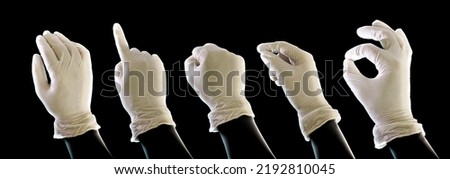 set of hands making various gestures in latex gloves on a black background