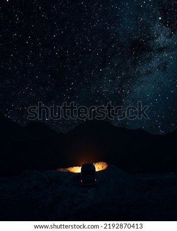 Car in the mountains. Milky Way