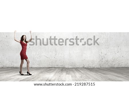 Pretty woman in red dress with white blank banner