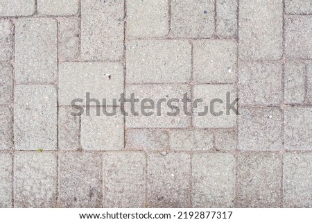Stone patio tiles. Texture Figured Paving Slabs. seamless texture. high resolution. Coating with modern textured paving tiles of square shape. Paving slabs close up as a background