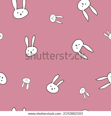 White bunny faces - seamless pattern with animals on dirty pink background	