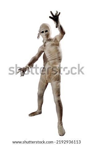Mummy with skull head standing with claw hands isolated over white background