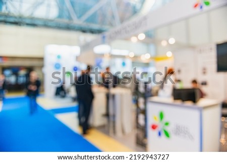 Event trade show expo background. Abstract blurred shopping mal- bokeh lights. Expo business- booth stand
