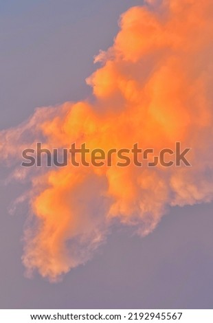 Sky after rain background. Cloudy. Sunset. Beautiful sky. Natural colour. Orange cloud. Cloudscape.