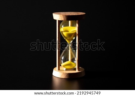 hourglass isolated on dark background