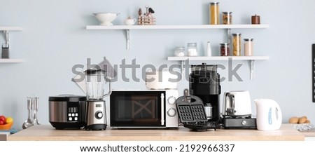Different household appliances in kitchen Royalty-Free Stock Photo #2192966337