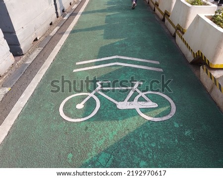 special lane for cyclists.  comes with green paint and bicycle logo