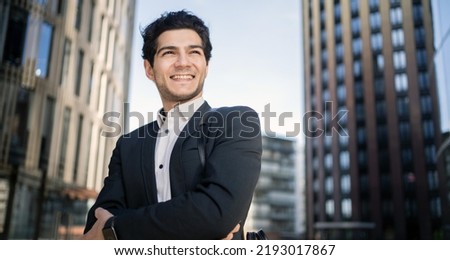 Portrait of a businessman manager a man in a business suit goes to the office.