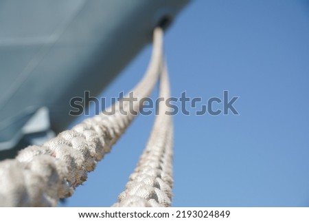 ship. ship docked in the port. detail. the ropes of a moored ship. Royalty-Free Stock Photo #2193024849