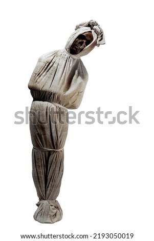 Indonesian ghost called pocong, covered with a linen shroud, isolated over white background Royalty-Free Stock Photo #2193050019