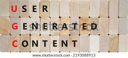 UGC user generated content symbol. Concept words UGC user generated content on wooden blocks on a beautiful wooden background. Business and UGC user generated content concept. Copy space. Royalty-Free Stock Photo #2193088913
