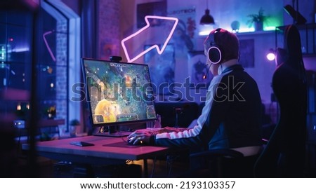 Professional eSports Female Gamer Plays RPG Strategy Video Game with Lots of Action and Fun on Her Powerful Gaming Personal Computer at Home. Cyber Gaming Stylish Retro Neon Room.