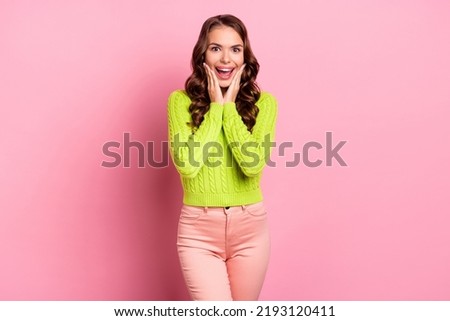 Photo of nice woman wavy hairdo hands touch cheeks impressed get award wear stylish green knitwear jumper isolated on pink color background