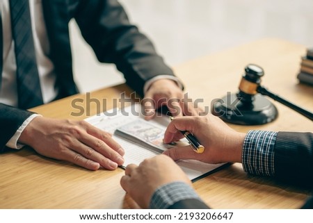 business law concept lawyer business Consultation between male lawyers and business clients The company provides tax and legal services and discusses contract documents between male lawyers 