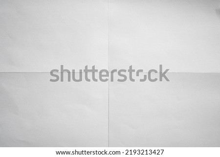 White paper crisp folded in four fraction background