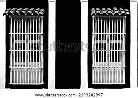 Elegant white windows in the Colombian Caribbean. Black and white photography. 