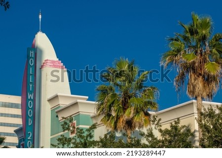 Hollywood movie theatre sign with palm trees