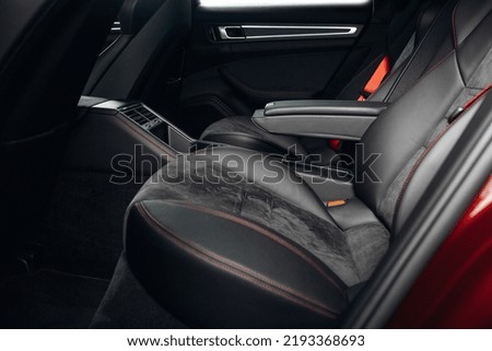 Luxury car rear seats row. Expensive car leather seats. Cozy and comfortable seats of vip transfer car  Royalty-Free Stock Photo #2193368693