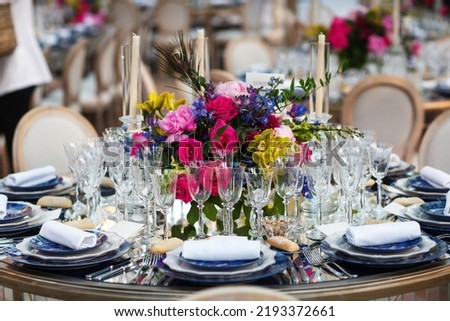 Decorated served table for wedding party or other event. Royalty-Free Stock Photo #2193372661