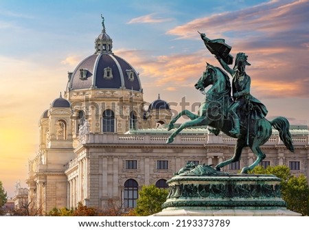 Statue of Archduke Charles on Heldenplatz square and Museum of Natural History dome at sunset, Vienna, Austria Royalty-Free Stock Photo #2193373789