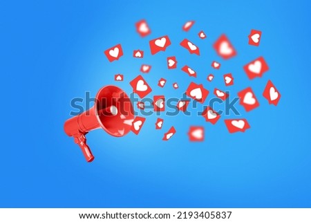 Like icons flying from the red loudspeaker on blue background, a concept. Creative idea, advertising in social networks. Communication and success. Subscribers approve and are engaged Royalty-Free Stock Photo #2193405837