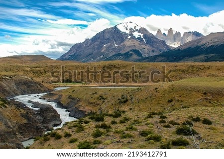 The peaks of Paine Grande, Cuernos and Torres del Paine with the turquoise glacier waters of the serrano river near Puerto Natales, Patagonia, Chile. Royalty-Free Stock Photo #2193412791