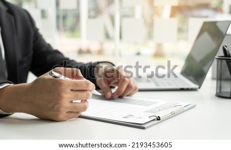 Business people hold a resume and talk to job applicants for job interviews about careers and Their personal history in the company. Recruitment concepts. Royalty-Free Stock Photo #2193453605