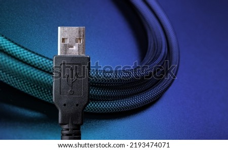 Close-up black USB Type-A Male cable plug on black background with copy space