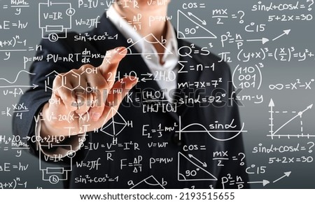 Mathematical expressions with business hand pointing a finger at a formula. Solution to the problem concept Royalty-Free Stock Photo #2193515655