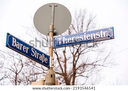 Street sign in Munich, Bavaria, Germany. Theresienstrasse and Barer Strasse.