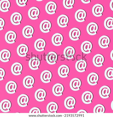 Creative pattern on neon pink background. At sign, information technology inspiration.