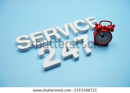 247 Service alphabet letters on blue background