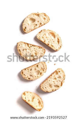 Fresh homebaked artisan sourdough bread. Slices of bread isolated on white background, design element. Royalty-Free Stock Photo #2193592527