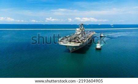 Nuclear ship Military navy ship war ship carrier full loading fighter jet aircraft and helicopter patrol. in front of War Ship or Side view Royalty-Free Stock Photo #2193604905