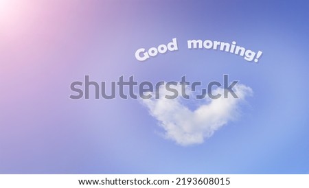 A heart-shaped cloud against a blue sky with the inscription good morning and a place to copy.