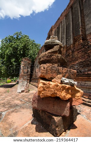 Tourist of Chinese and Taiwanese.Have faith set high brick in the ruins for better life,job and money. This photo take at " Wat Thammikarat " temple,Ayutthaya,Thailand