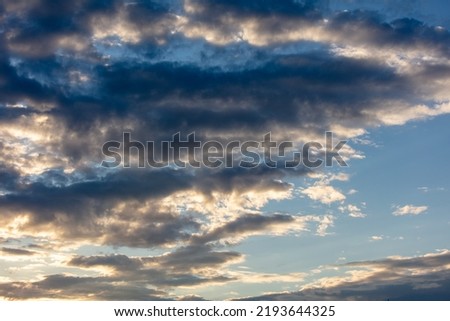 Clouds in the sky at sunset. Background