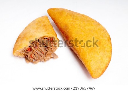 Fritish empanada stuffed with meat. Traditional food in Venezuela and Colombia
 Royalty-Free Stock Photo #2193657469