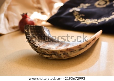 shofar (horn) isolated with  rosh hashanah (jewish holiday) concept . traditional holiday symbo l.In the background of a prayer arrangement and tallit
sidour
 Royalty-Free Stock Photo #2193672993