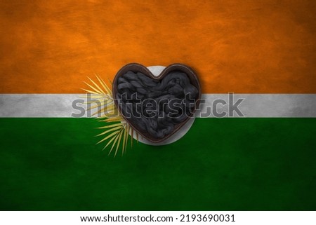 Wooden basket heart form on background of national flag. Photography and marketing digital backdrop. India